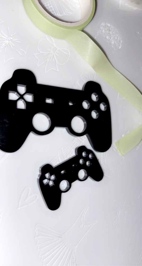 large controller charm or topper