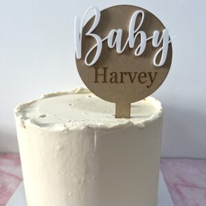 Wooden background round cake topper with baby name