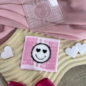 Hugs and kisses smiley embosser